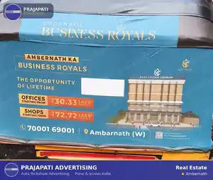 Auto rickshaw advertising in Ambernath for a real estate project — hood branding by Prajapati Advertising
